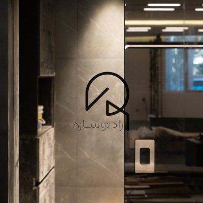اجرای درب مخفی ریلی طراحی و اجرای شرکت فرحو دیزاین واقع در باغ فردوس تهران