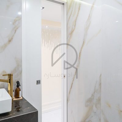اجرای درب مخفی کشویی پروژه بازسازی مهندس ظریفیان